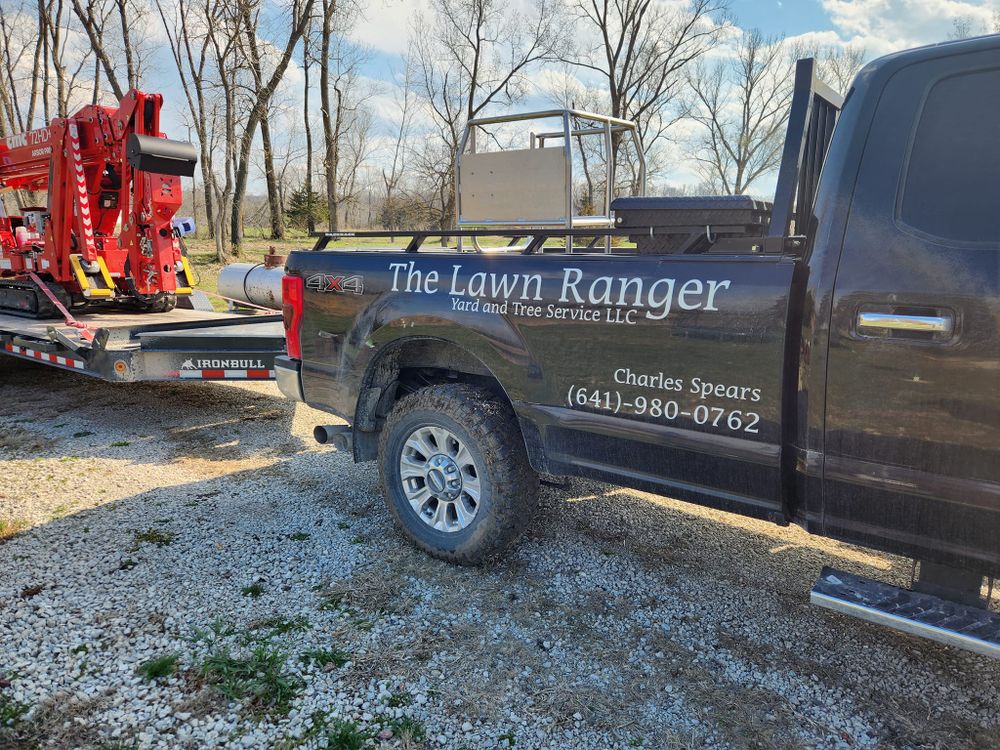 Our Hauling service efficiently removes tree debris, branches, and waste from your property, ensuring a clean and tidy landscape after any tree work. Leave the heavy lifting to us! for Lawn Ranger Yard And Tree Service in Ottumwa, IA