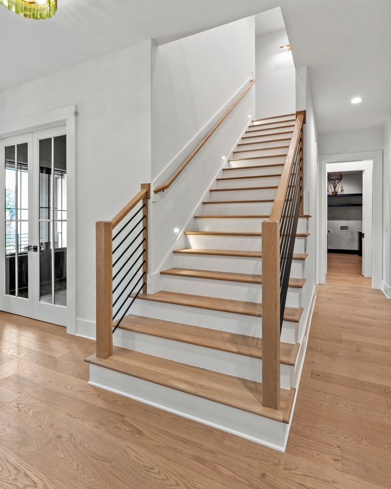 Enhance your home's safety and style with our expert stair railings service. We offer custom designs, quality materials, and precise installation to seamlessly blend functionality with aesthetics in every project. for Quality Trim NC in Raleigh, NC