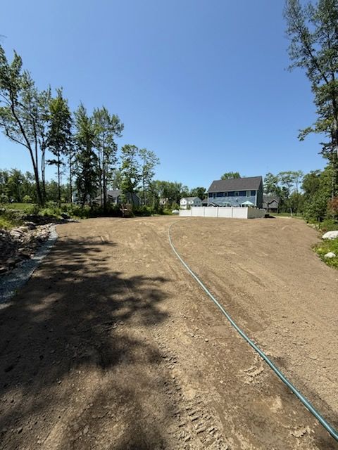 Our Land Grading service ensures your property has a smooth, level surface for optimal drainage and landscaping, enhancing both safety and aesthetic appeal while preparing the ground for construction or renovation projects. for Gray Earthworks in Levant, ME