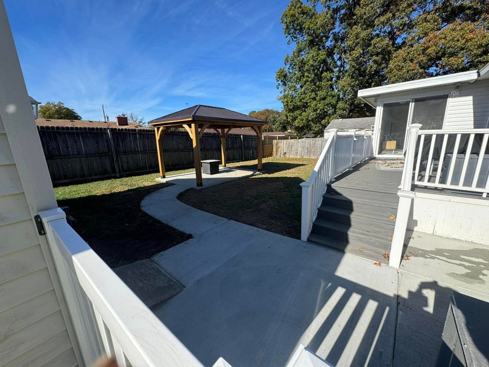 Enhance your outdoor space with our expert Patio Design & Installation service, offering customized, durable concrete solutions that blend functionality and style to create the perfect setting for relaxation and entertainment. for Concrete Titans in Chesapeake, VA