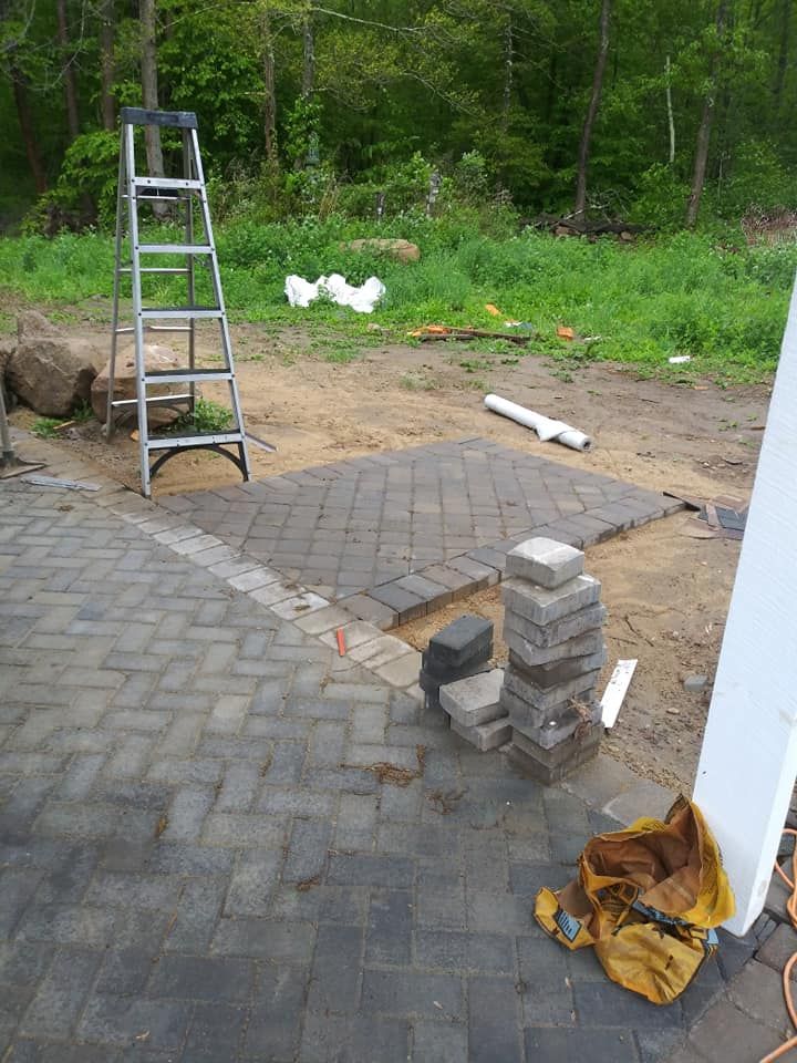 Transform your outdoor space with our Patio Design & Construction service, offering customized solutions that blend functionality and aesthetics to create the perfect area for relaxation and entertaining in your backyard. for Cadieux's Landscaping in Somerset, MA