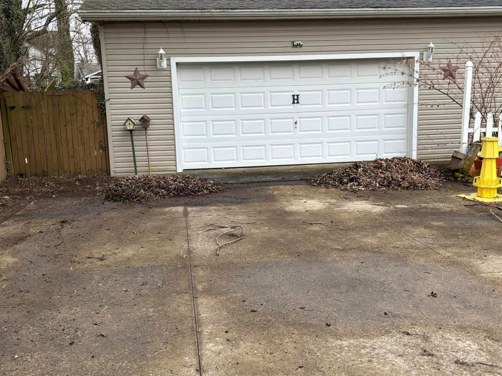 Our Fall and Spring Clean Up service ensures your outdoor space is pristine and ready for each season, including leaf removal, pruning, debris clearing, and preparing garden beds for new growth. for Lopez Landscaping & Snow Removal LLC in Conneaut, OH
