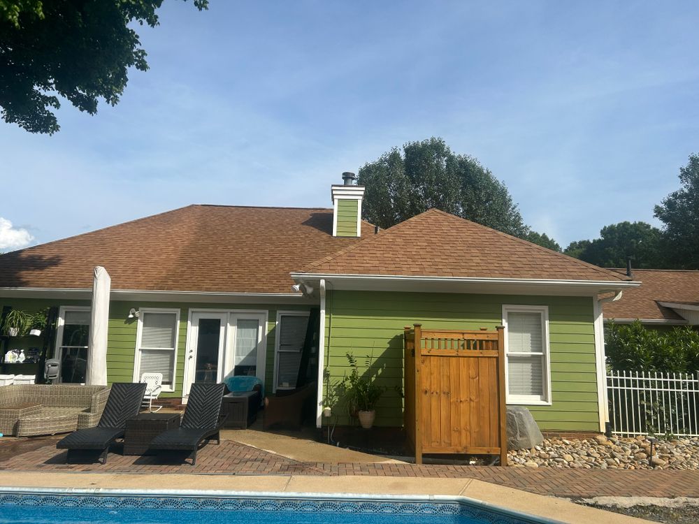 Our roof cleaning service effectively removes dirt, moss, and algae buildup to enhance your home's curb appeal, extending the life of your roof while preventing potential damage caused by unwanted debris. for 4U Pressure Washing in Huntersville, NC