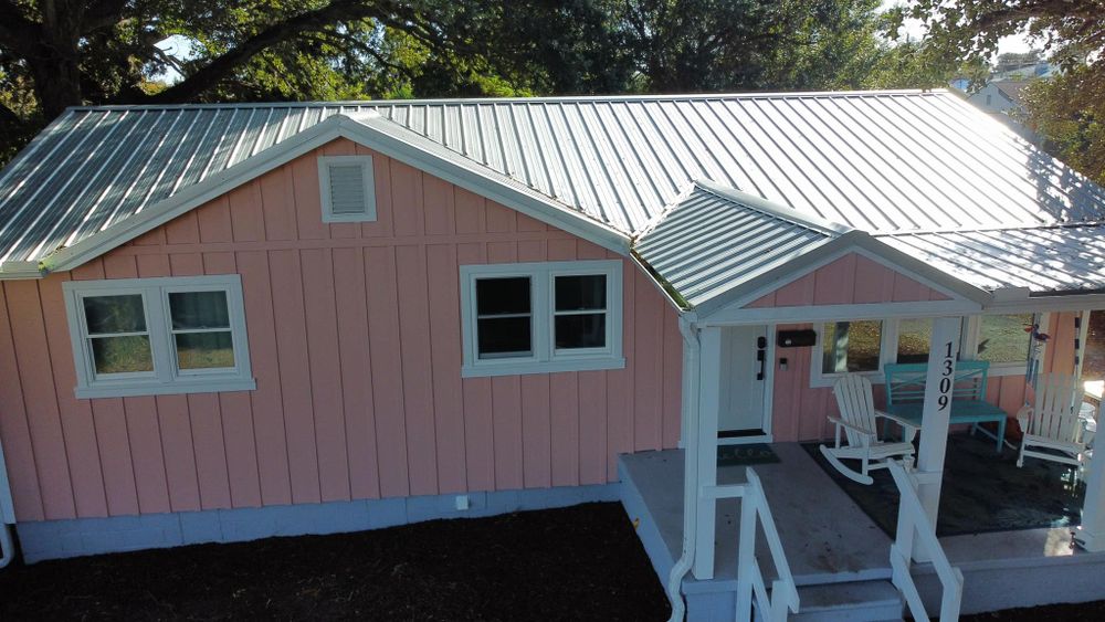 Our Roofing Replacement service provides homeowners with a professional, reliable solution to replace their old or damaged roof, ensuring structural integrity and enhancing the aesthetic appeal of their home. for Kenneth Mills Roofing & Restoration in Morehead City, NC