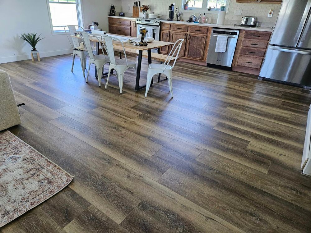 Revamp your home with our premium vinyl flooring services. Our experienced team offers expert installation, durable materials, and a wide range of colors and styles to suit any design preference. for AVance Flooring in Bridgman, MI