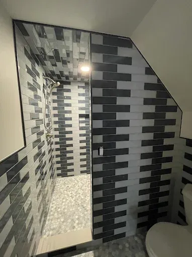 Transform your bathroom with our expert tile installation services, offering a range of stunning designs and durable materials to enhance aesthetics and functionality, ensuring a beautiful and lasting finish. for Gribek LLC in Ewing Township, NJ