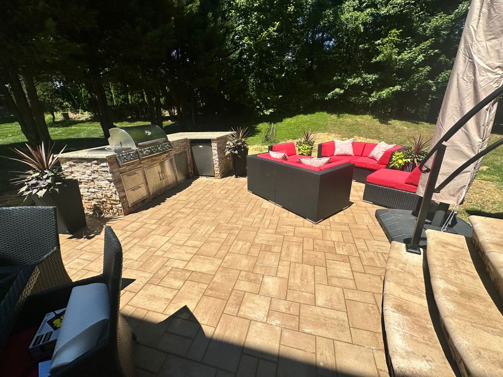 Transform your outdoor space with our expert Outdoor Kitchens Fire pits/Fireplace service. Elevate your backyard entertainment with a custom-built fire feature that will enhance ambiance and functionality for any occasion. for Matteo Hardscapes in Towson,  MD