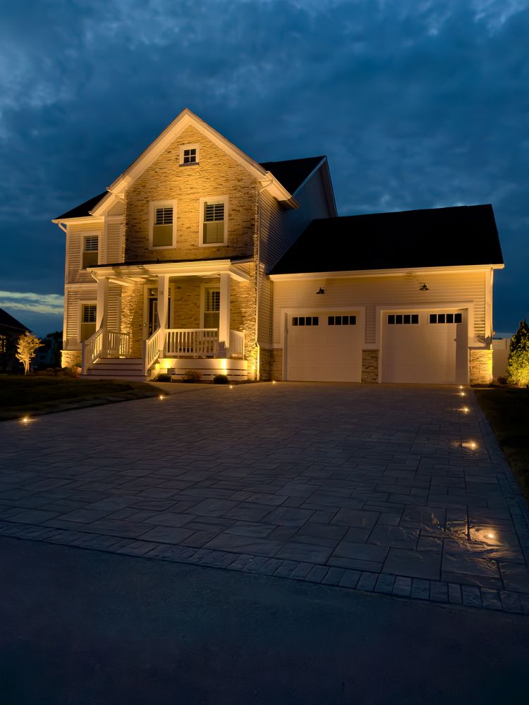 Illuminate your home with our expert landscape lighting service. We design and install beautiful, energy-efficient lighting solutions to enhance safety and highlight the natural beauty of your outdoor spaces. for SoDel Stone Works & Construction LLC in Sussex County, DE