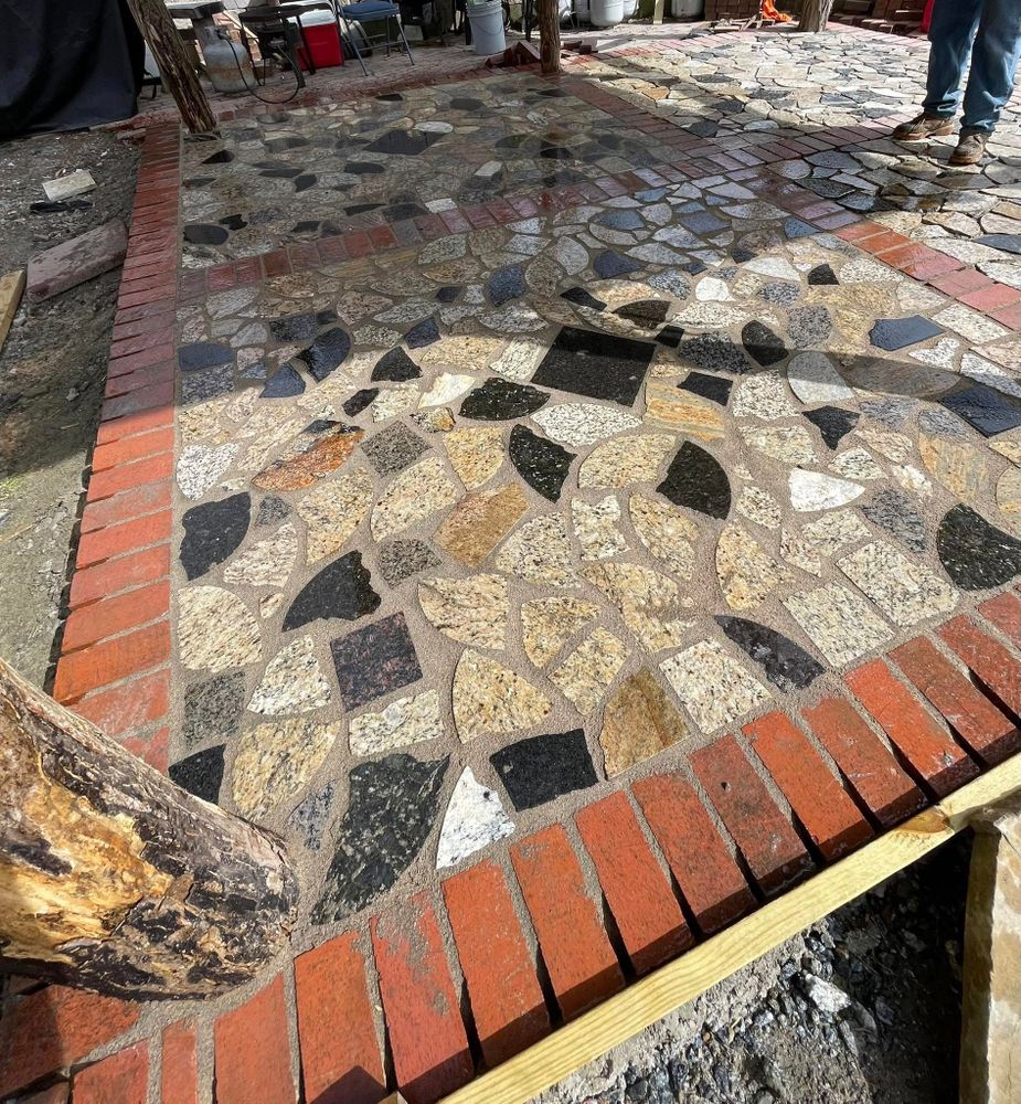 Transform your outdoor space with our expert concrete pavers service, offering durable and stylish solutions that enhance both functionality and aesthetic appeal for pathways, patios, or driveways. for Torres Tree Service and Landscaping in Hendersonville, NC