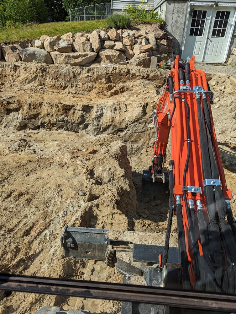 Our trenching and utilities installation service safely digs precise pathways for water, sewer, gas, and electrical lines, ensuring efficient placement, minimal disruption to your property, and reliable infrastructure for new construction. for Krahn Excavation in Portland, Maine