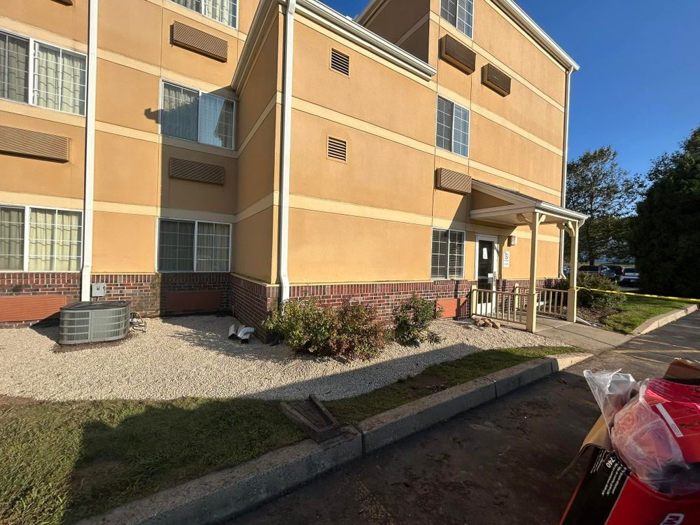 Our commercial landscaping service transforms business properties with expertly designed and maintained landscapes, enhancing curb appeal and creating a welcoming environment that impresses clients while meeting your unique aesthetic and functional needs. for SourceOne Property Maintenance in Southbridge, MA