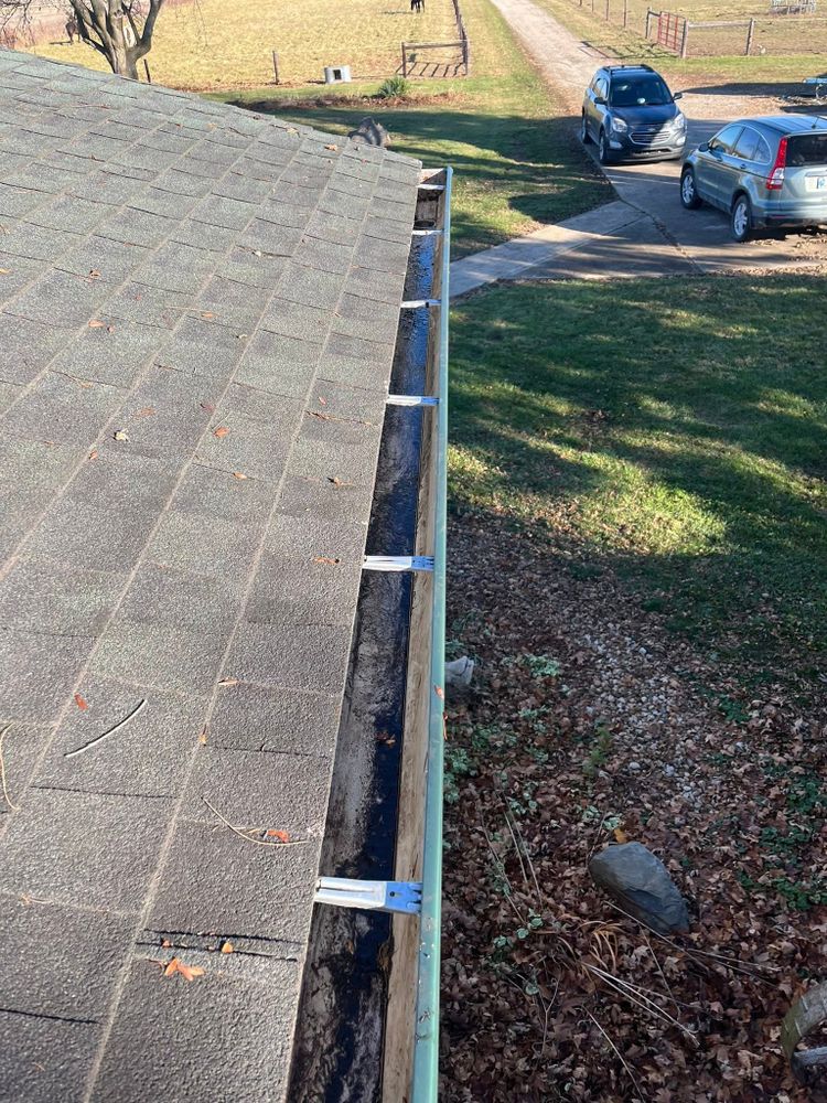 Our professional gutter cleaning service ensures your home's gutters are debris-free, preventing water damage and enhancing structural integrity by efficiently directing rainwater away from your roof and foundation. for Keesling Construction Services LLC in Muncie, IN