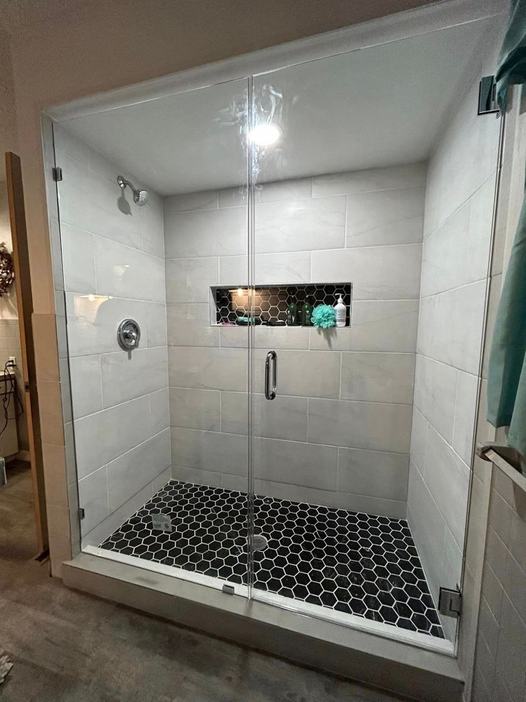 Transform your outdated bathroom into a luxurious and modern oasis with our expert renovation service. From upgrading fixtures to installing new tile, we will create the perfect retreat for you. for DZ Construction in Lamar, CO