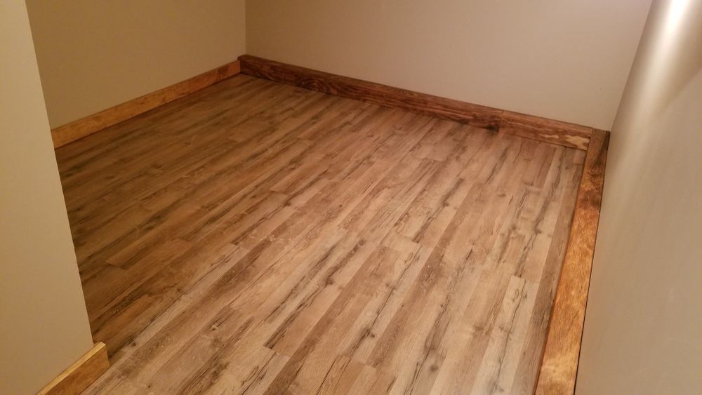 Transform your living spaces with our expert flooring services. We offer quality installation and a wide range of materials to enhance the beauty, comfort, and durability of your home. for Justice Kitchen & Bath Works, LLC in Greeley, CO