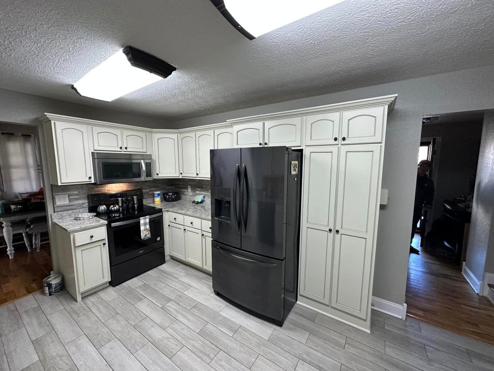 Our Kitchen and Cabinet Refinishing service rejuvenates your kitchen by giving it a fresh look, enhancing its aesthetic appeal, and extending the life of your cabinets at an affordable cost. for Preach’s Painting LLC in Somerset, KY