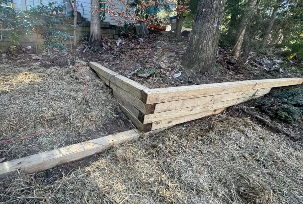 Enhance your landscape's beauty and functionality with our expert retaining wall construction service, designed to prevent soil erosion while adding aesthetic appeal and durability to your outdoor space. for Brumblebee's Landscaping & Cleaning Services in Loganville, GA