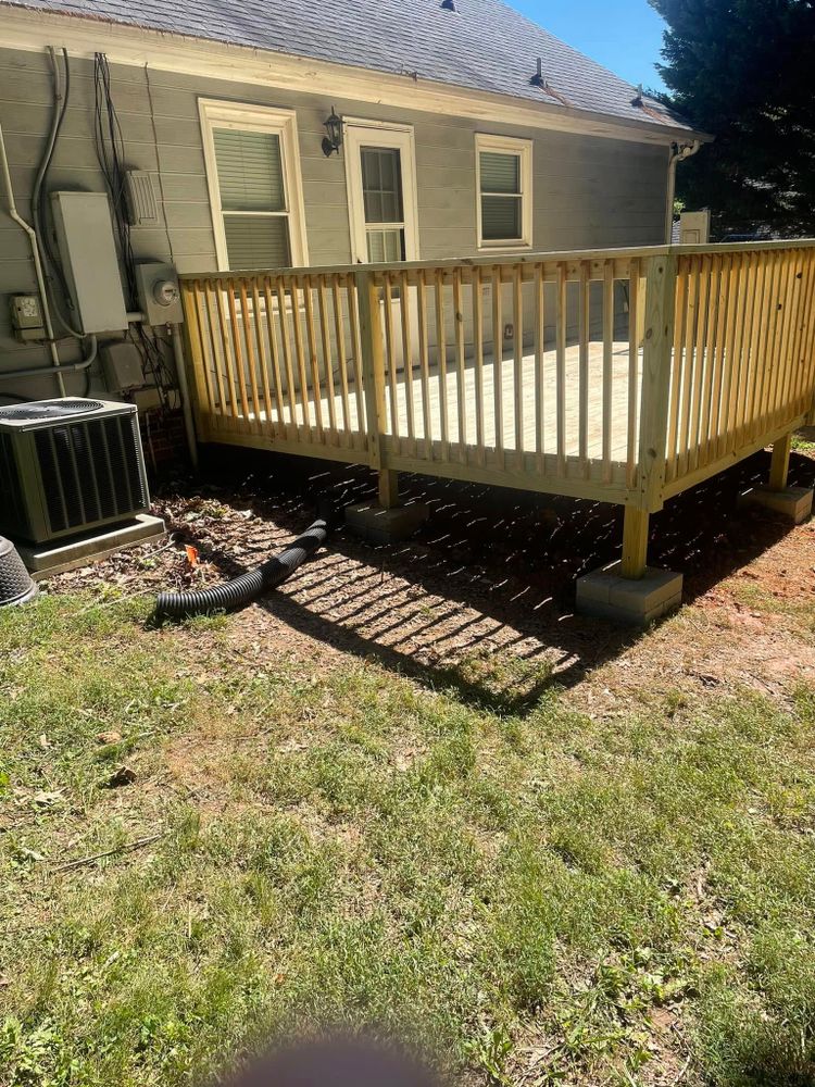 Transform your outdoor space with our expert deck and patio installation services, blending functionality and beauty. Enjoy a personalized design that enhances your home's appeal and increases its value. for Harmon Group in Bessemer City, NC