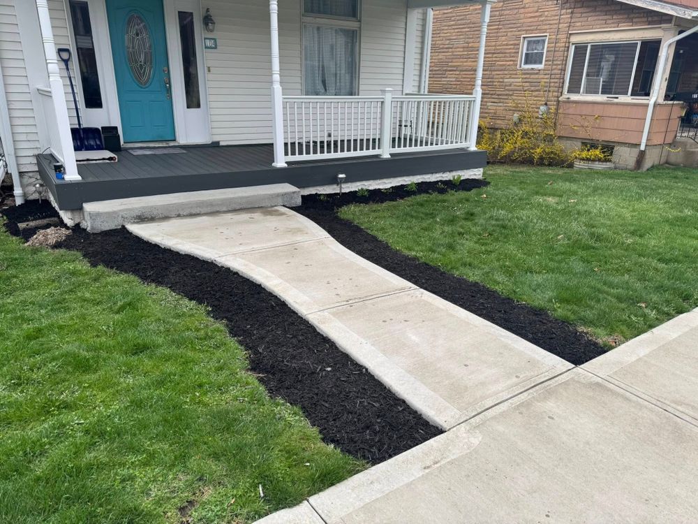 Our Mulch Installation service enhances your landscape's beauty, conserves moisture, and suppresses weeds using high-quality mulch. Trust our experts to elevate your garden’s health and aesthetics seamlessly. for Duff’s Lawncare in Prospect, PA