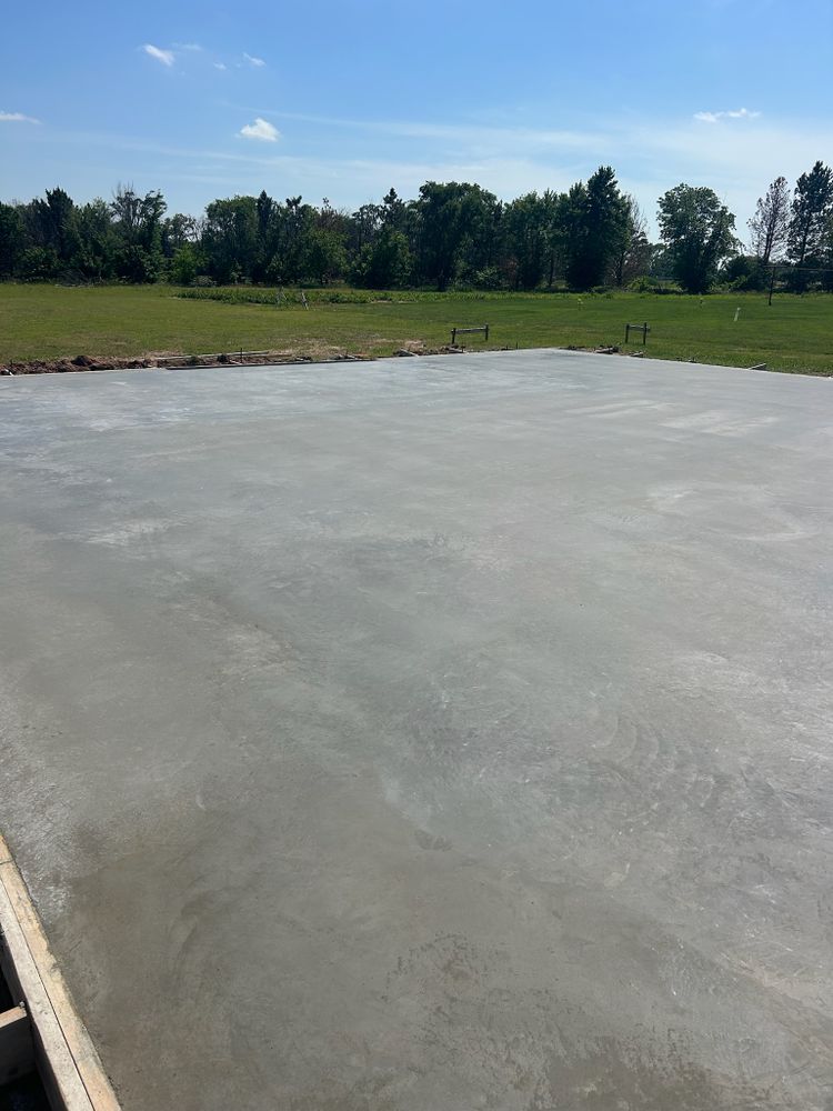 Our Concrete Slab Construction service ensures durable, high-quality slabs for foundations, patios, and driveways. We use top-grade materials and expert craftsmanship to provide lasting strength and reliability for your home projects. for Twisted Ridge Construction LLC in Cheney, KS