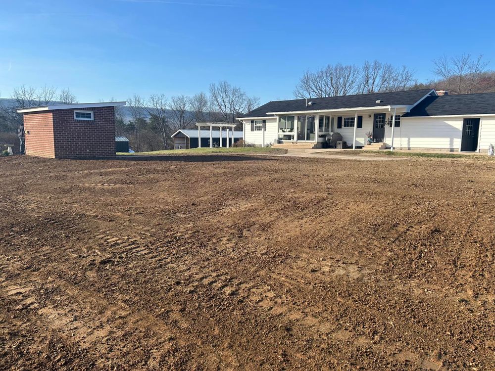 Our Leveling service expertly prepares your land for construction by ensuring a smooth and even surface. We enhance site stability and drainage efficiency while boosting your project's foundation integrity and overall success. for Pine Mountain Restoration, LLC Excavation and Fencing Contractor in Howard, PA