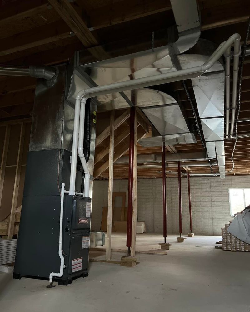 Our Ductwork Design and Installation service offers homeowners tailored solutions for efficient air flow, ensuring optimal heating and cooling performance while enhancing energy efficiency and indoor comfort. for Elevated Heating & Cooling in South Bend, IN