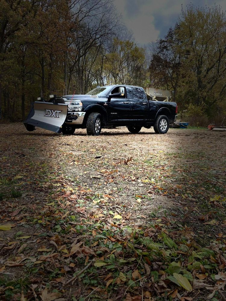 Our professional snow removal and salting service ensures your driveway and walkways are clear, safe, and accessible throughout the winter months, providing peace of mind for homeowners during harsh weather conditions. for The Guys Landscaping & Foundation Repairs LLC in Trenton, MI