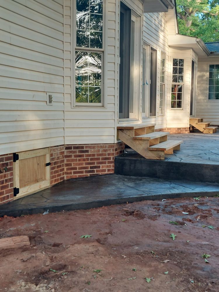 Our stamped concrete installation service transforms ordinary surfaces into stunning, textured designs resembling stone or brick, enhancing curb appeal with durability and style for any outdoor space on your property. for T&J Concrete in Anderson, SC