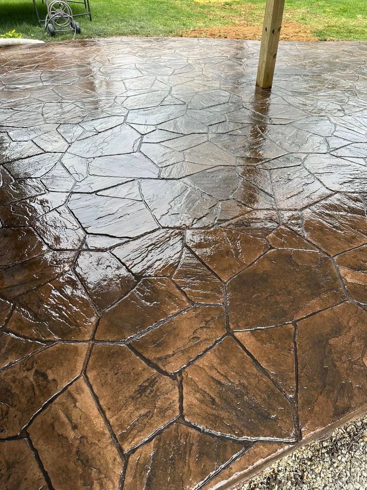Our Stamped Concrete Installation service transforms your outdoor spaces with customizable, durable designs that mimic high-end materials, enhancing aesthetics while ensuring long-lasting performance and value for your home. for Whorley Concrete Construction in Goode, VA