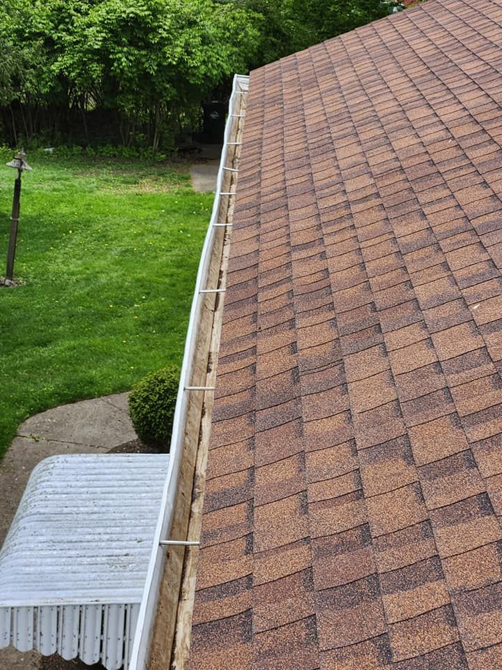 Our Gutter Cleaning service ensures your gutters are debris-free, preventing water damage and foundation issues. We prioritize safety and efficiency to protect your home's exterior with professional care. for Tel Ma Landscaping Maintenance LLC  in Urbana, OH