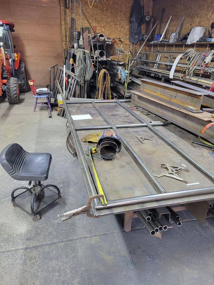 Our Metal Fabrication service transforms raw metal materials into custom pieces such as gates, railings, and furniture that enhance your home's aesthetic appeal and functionality with expert craftsmanship and precision welding techniques. for Abraham Fabrication in Lincoln, MI