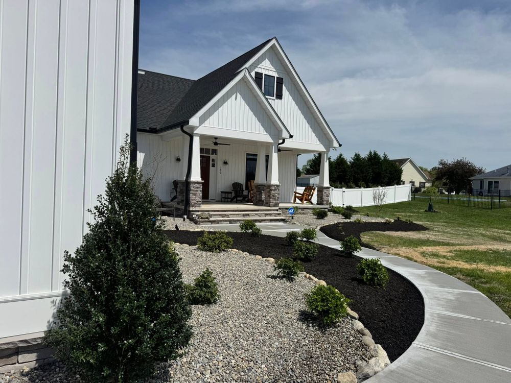 Transform your outdoor space with our Custom Landscaping service. We tailor designs to suit your vision, enhancing beauty and functionality while increasing property value and creating a unique backyard haven. for Broker Post Ground Crew in Sussex County, DE