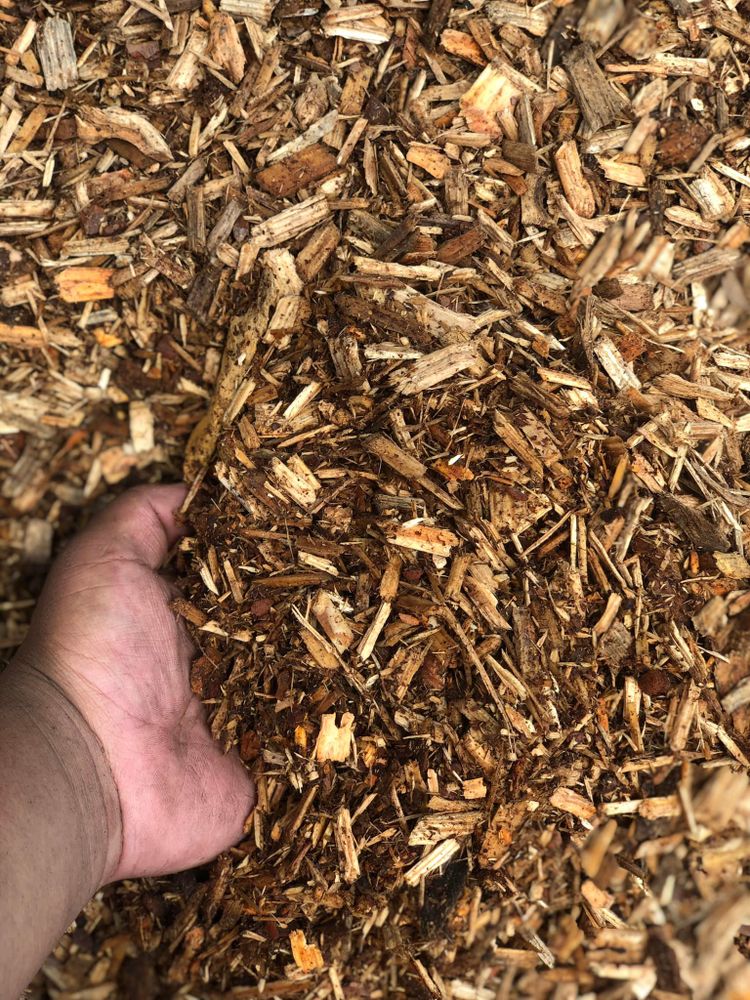 Enhance your garden's health and appearance with our professional mulch installation service. We provide expert layering to retain moisture, suppress weeds, and enrich soil for a thriving landscape all year round. for Castro Landscaping in Orange, NJ