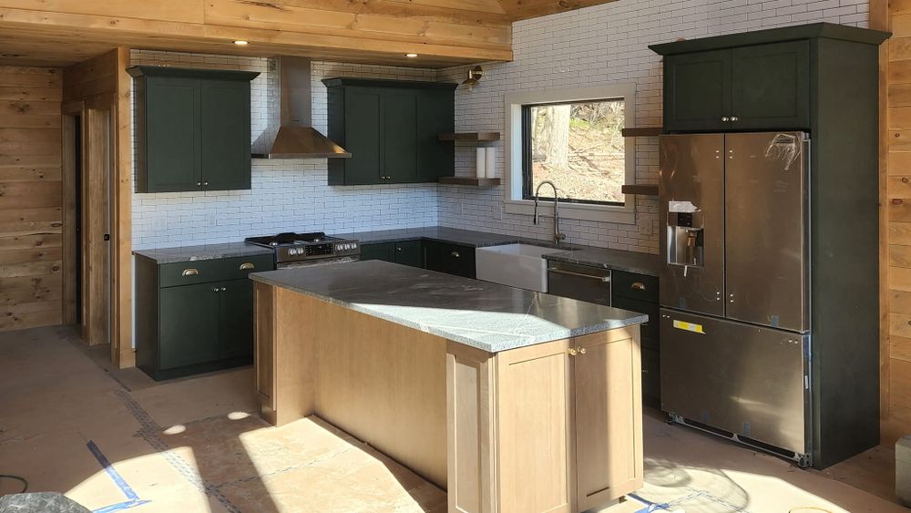 Transform your kitchen into a functional and stylish space with our expert renovation service. From custom cabinets to modern appliances, we'll bring your dream kitchen to life with quality craftsmanship. for Excel Construction Services in Mechanic Falls, ME