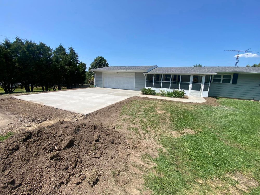 Our driveway install service provides homeowners with durable, custom-designed concrete driveways, ensuring professional craftsmanship and long-lasting results that enhance curb appeal and increase property value. for TDC Excavating in Dubuque, IA
