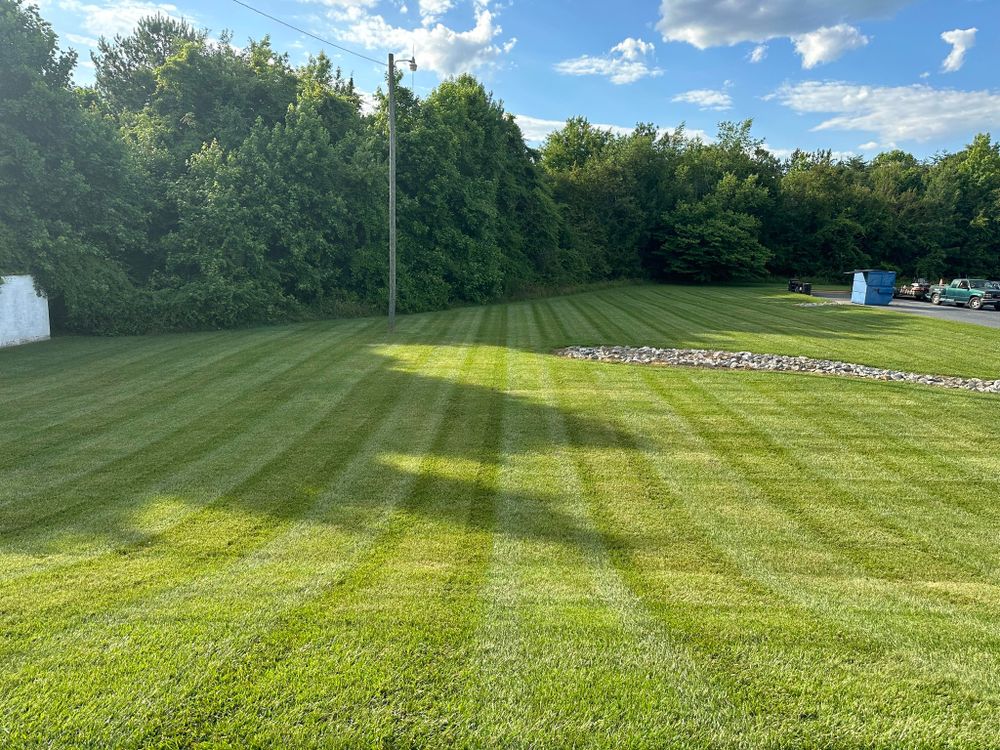 Our professional mowing service ensures your lawn is expertly trimmed and maintained, enhancing the overall look of your property and creating a beautiful outdoor space for you to enjoy. for Red Clay Landscapers in Sophia, NC