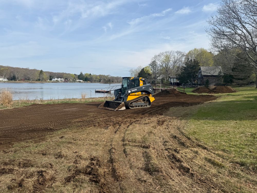 Our Skid Steer Work service offers precise and efficient earthmoving solutions for homeowners, ideal for landscaping, grading, and clearing projects. Enhance your property with our reliable expertise tailored to your specific needs. for DArcy  Cleveland & Sons Excavation LLC in Pawcatuck, CT