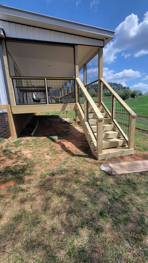 Transform your outdoor space with our expert Deck and Patio Construction services. We design and build durable, stylish decks and patios tailored to enhance the beauty and functionality of your home. for CDM Handyman Services in Mount Airy, NC