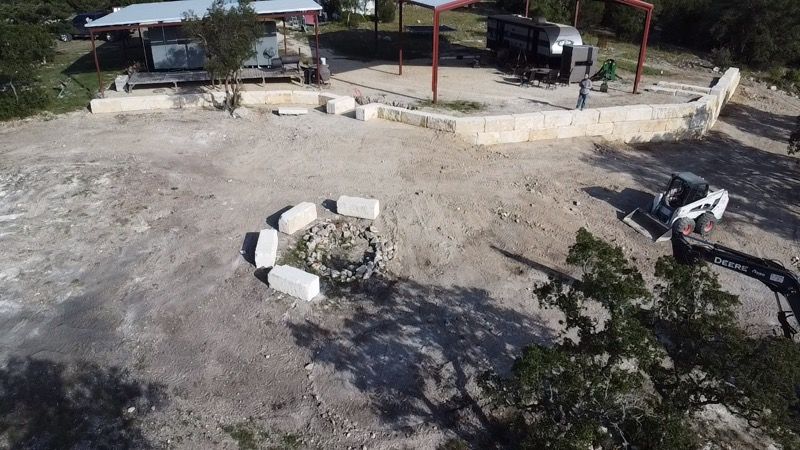 Limestone blocks retaining wall  for De Leon Carpentry & Renovation  in Leakey, TX