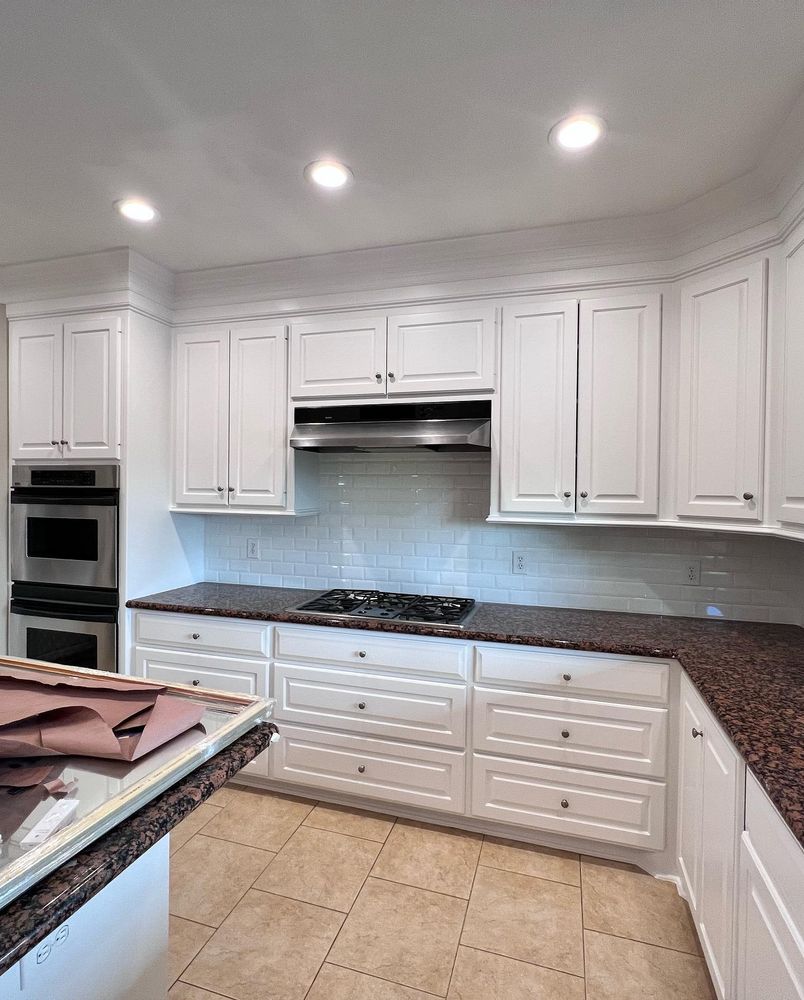 Transform your kitchen and cabinets with our refinishing service. We will strip, sand, paint or stain your existing surfaces for a fresh new look without the cost of replacing. for Leon Painting in Houston, TX