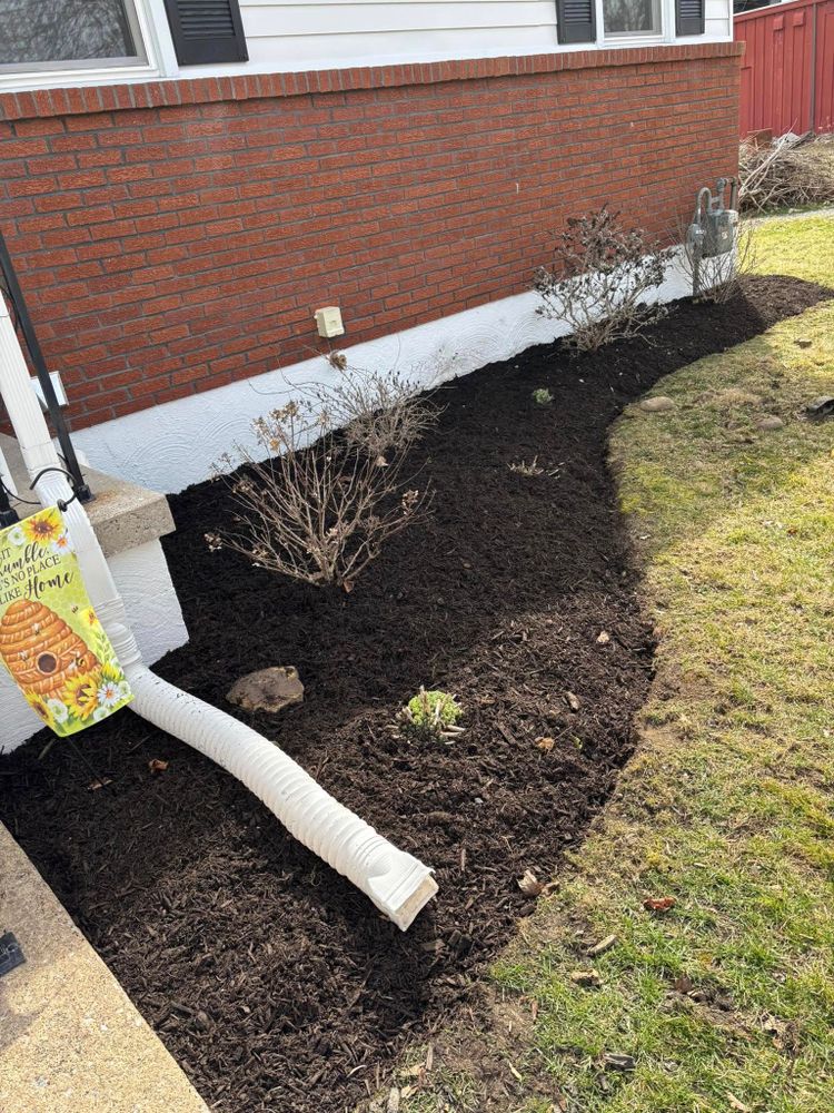 Enhance your garden's health and aesthetics with our professional mulch installation service. We provide expert application to retain soil moisture, suppress weeds, and enrich the appearance of your outdoor spaces. for Bryant Property Solutions in Altoona, PA