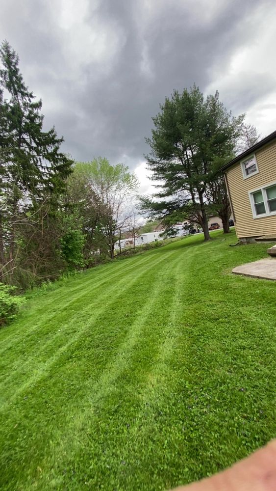 Our Lawn Care and Maintenance service keeps your yard healthy, green, and beautifully trimmed with mowing, edging, fertilization, weed control, and seasonal care tailored to your lawn’s needs. for Saul’s Landscaping Services in Williamsport, PA