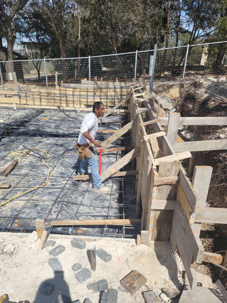 Enhance your landscape's stability and aesthetics with our expert retaining wall services. Our durable solutions prevent soil erosion while adding functional elegance to your outdoor spaces, crafted by concrete specialists. for Affordable Concrete Specialist in Round Rock, TX