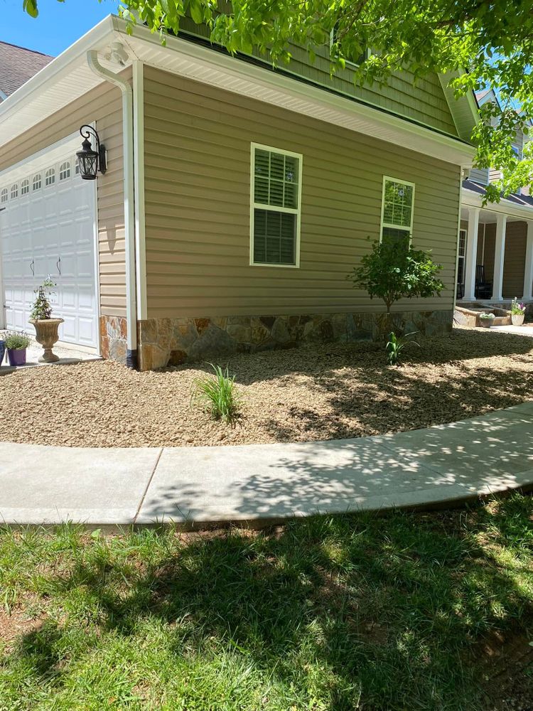 Transform your outdoor space with our expert landscape installation services. Enhance curb appeal and efficiently manage driveway cost, creating a beautiful, inviting entrance to your home. for Leal’s Lawn Service and Excavation in Dayton, TN