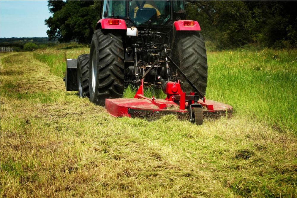 Our Brush Hogging service efficiently clears overgrown vegetation on your property, ensuring a clean and manageable landscape. Perfect for preparing land for new fencing or enhancing overall yard aesthetics. for Browns' Fencing & Equipment in Fairmount, GA