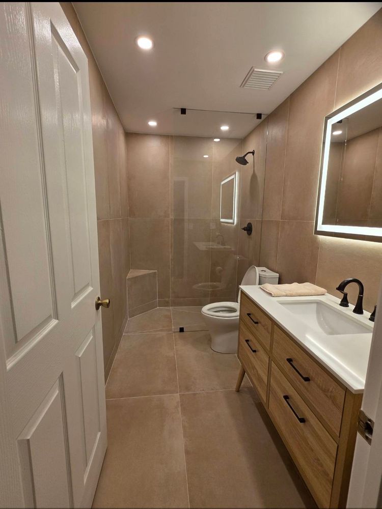 Transform your bathroom into a modern oasis with our expert renovation services. We ensure quality craftsmanship, personalized design, and efficient project management to enhance comfort and elevate your home's value. for Call Me Handy in Hialeah, FL