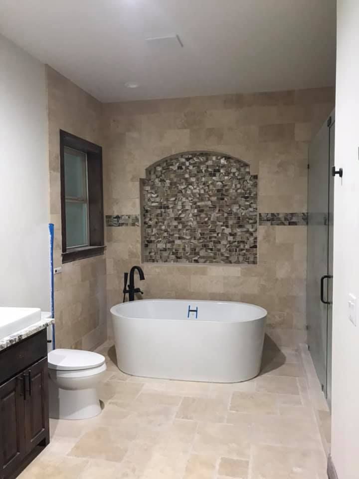 Transform your bathroom with our Custom Showers service. We design and install personalized, elegant showers tailored to your space and style preferences, enhancing functionality and elevating the aesthetic of your home. for Nail Star Building & Construction in Austin, TX