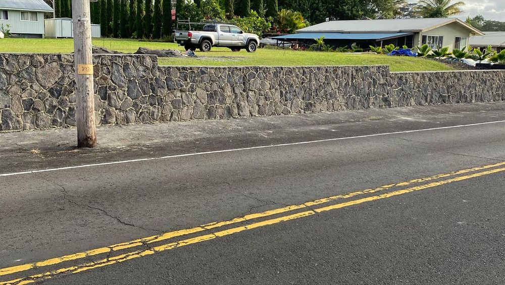 Our expert team constructs durable and visually appealing retaining walls tailored to your landscape needs. Enhance the functionality and aesthetics of your outdoor space with our professional construction service. for Pita’s Masonry in Hilo, HI