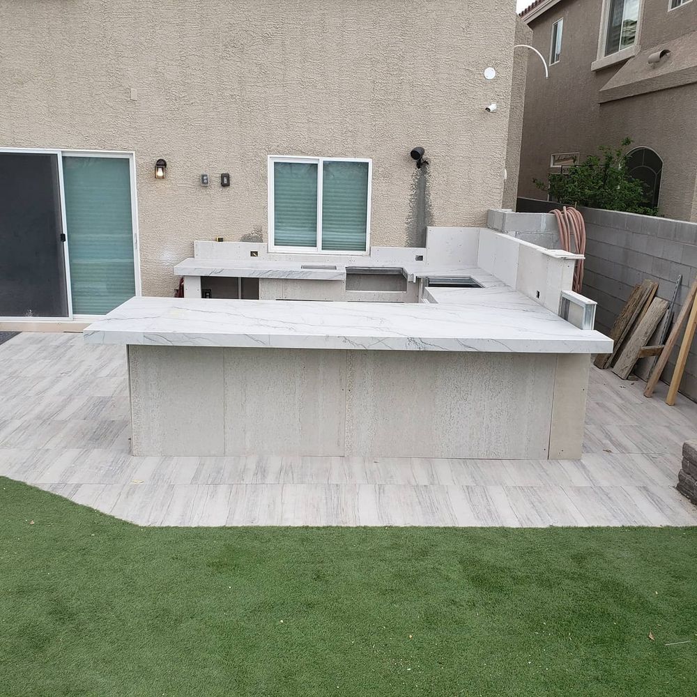 Transform your yard into a beautiful, functional retreat with our outdoor space construction services. We design and build patios, walkways, kitchens, fire features, and custom living areas tailored to you. for IZ General Repairs in Las Vegas, NV