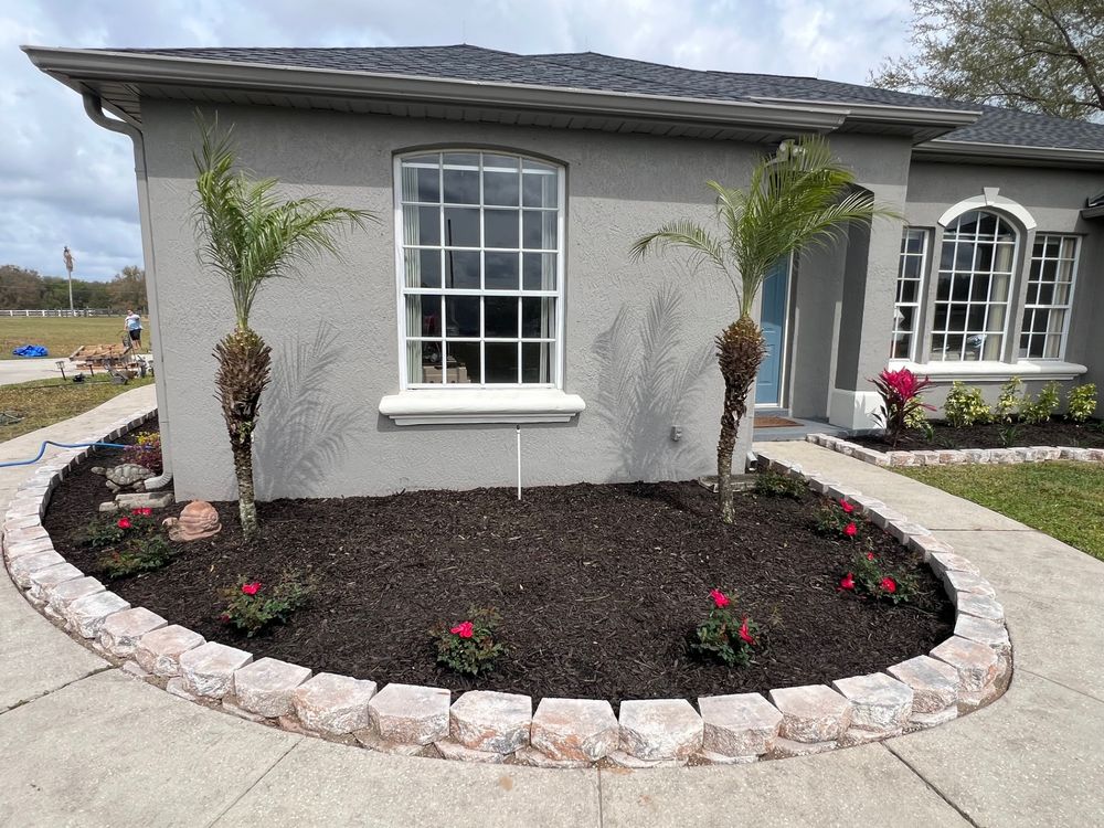 Landscape with retaining wall for Thurmond & Sons Landscaping  in Montverde, FL