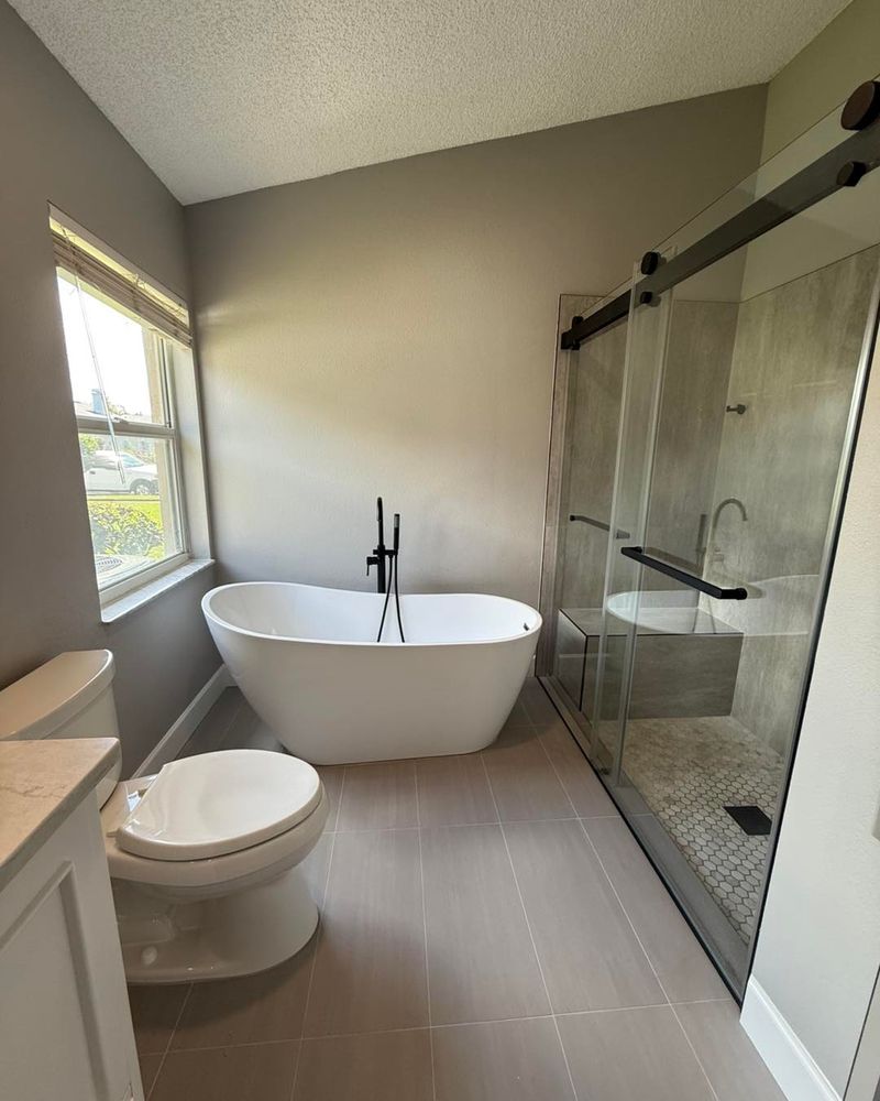 Enhance your space with our professional bathroom renovation service, transforming outdated areas into stunning, functional retreats with quality craftsmanship and attention to detail that elevates both style and comfort in your home. for Color Me Fresh Painting in Orlando, FL